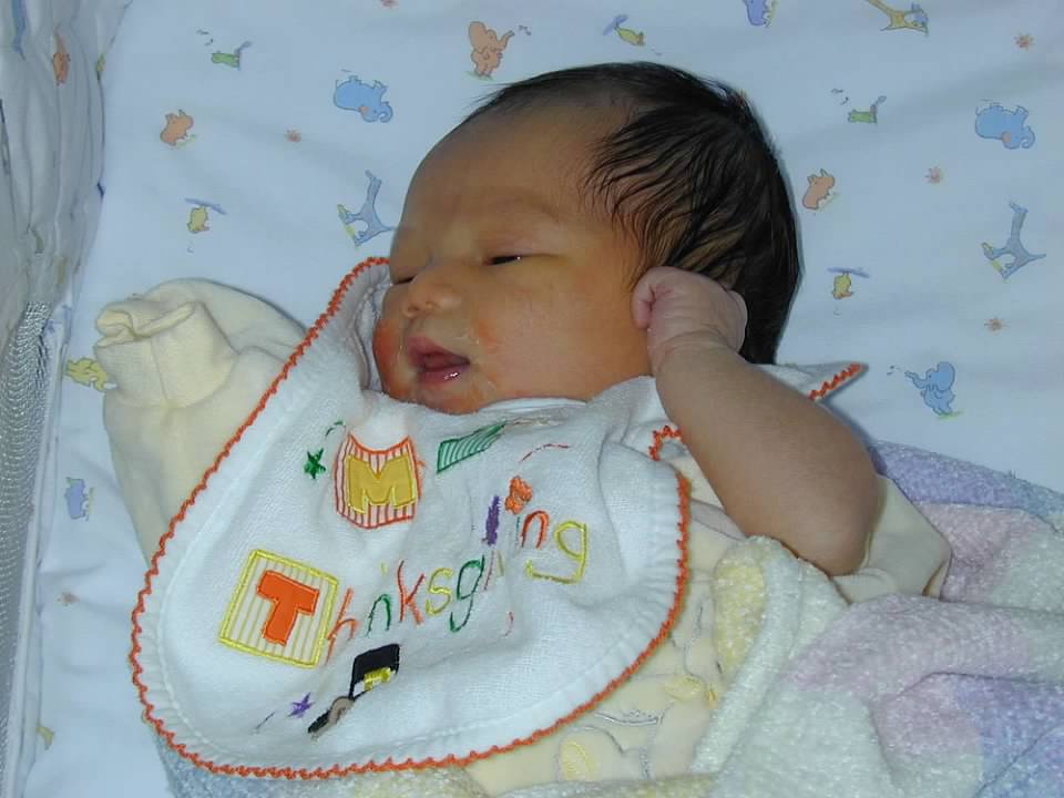 Me, two days after birth, enjoying my first Thanksgiving, covered in eczema.